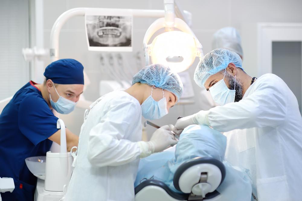 dentist performing dental care | dentist near me