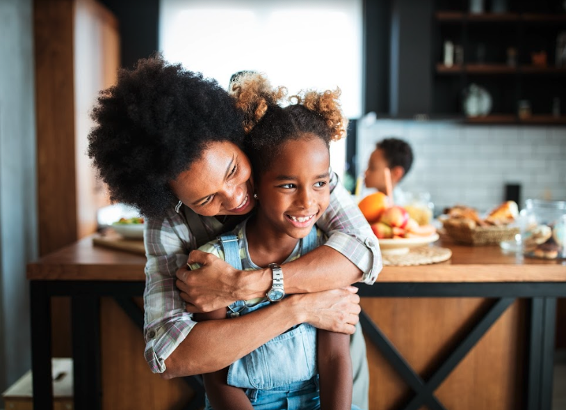 mother and daughter hugging | airway dentistry oakbrook terrace il