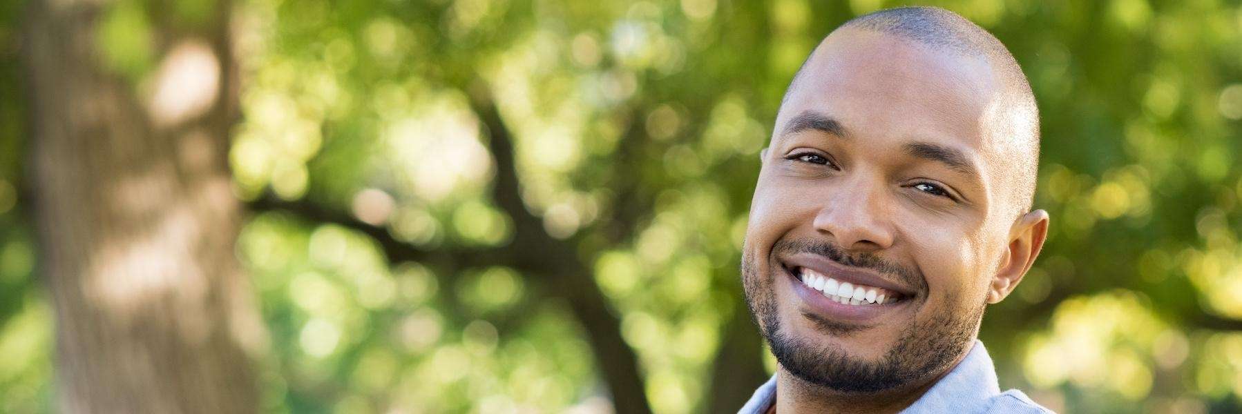 man smiling outside | dentist oakbrook