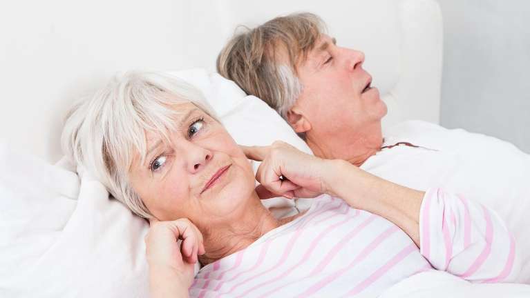 older woman annoyed at snoring | the airway dentist