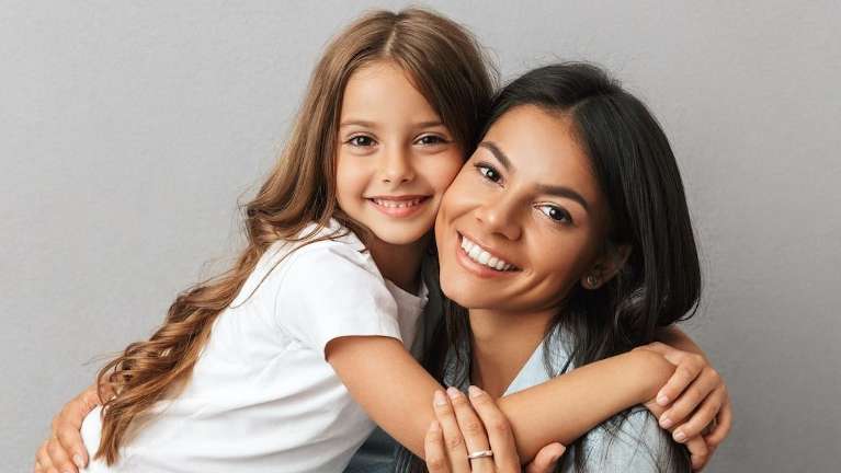 mother hugging daughter | airway dentist oakbrook terrace il